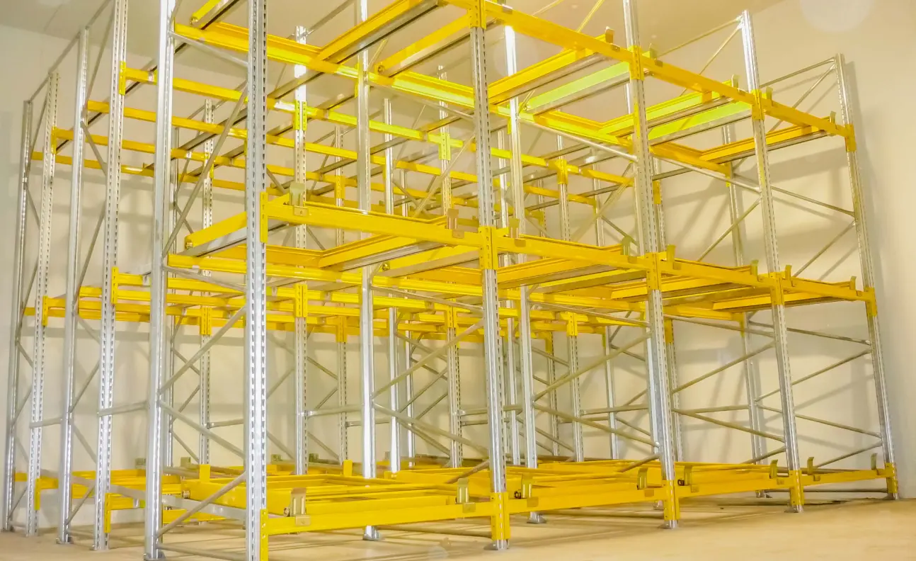 Cart-based push-back racking system for high-density warehouse storage and pallet flow optimisation